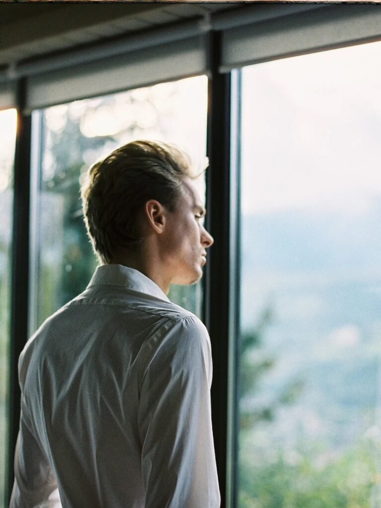 Exhausted founder reflecting alone in office during late night work session